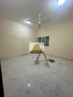 2-bedroom apartment and living room in Al Nuaimiya Industrial, next to Thumbay Hospital. Balcony, 2
