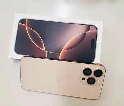 iPhone 16 Pro Max سعة 256GB – اللون تيتنيوم صحراوي