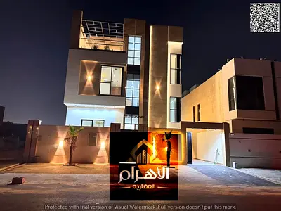 Luxury villa for sale in Al Helio, Ajman | 4 master bedrooms | Near Sheikh Mohammed Bin Zayed Road | Includes registration fees, electricity, water, a