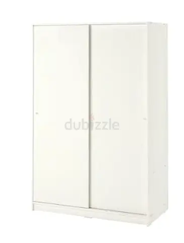 white sliding wardrobe (IKEA PAX-style) — compact storage