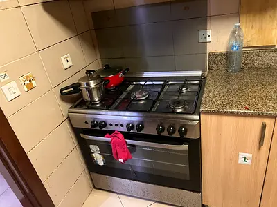 Used freestanding gas cooker with oven - stainless steel (good working condition)