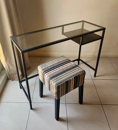 Glass-top metal study table with striped stool