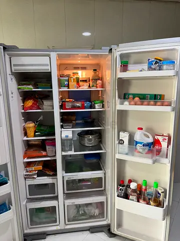 Large Side-by-Side Refrigerator in Good Working Condition
