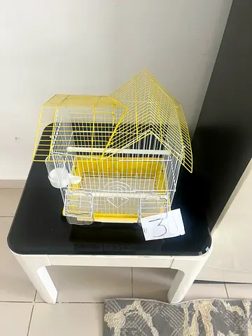 Small yellow bird cage with accessories - good condition