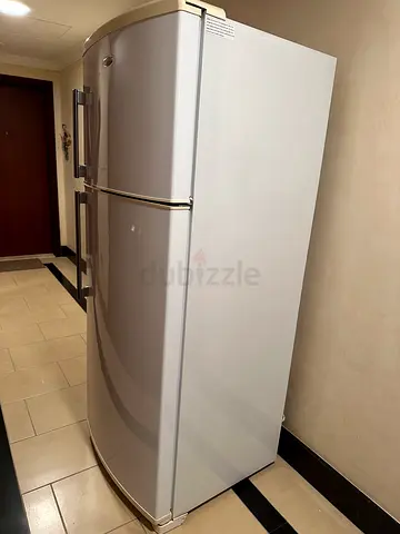 Used double-door Whirlpool refrigerator in good working condition