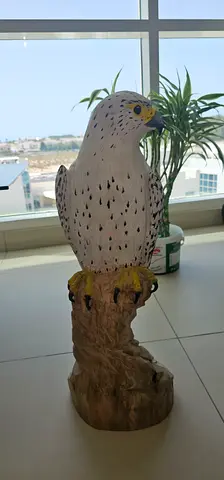 Hand-carved Wooden Falcon Statue on Trunk Base
