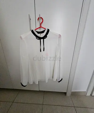 White long-sleeve blouse with black trim, size Large
