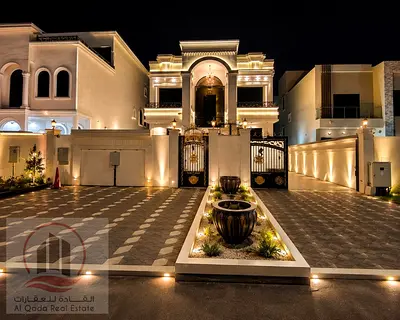 Villa for sale in Ajman Al Aaliyah, 5 master bedrooms, majlis, living room, and maid's room. Freehold ownership for all nationalities. Includes electr