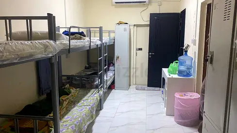 ## Near Etisalat Metro## Furnished BED SPACE for Bachelors in a villa with bath and kitchen
