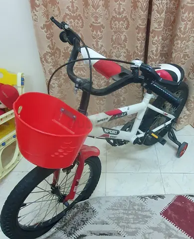 Childrens 16 White  Red Bicycle with Training Wheels and Front Basket