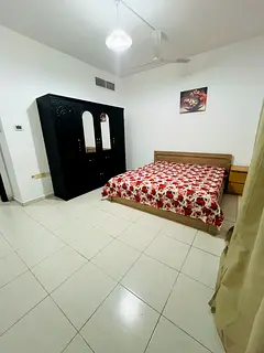 Big Furnished Room with Balcony Available 1 min to Dubai/ Sharjah border For couples ladies or Male