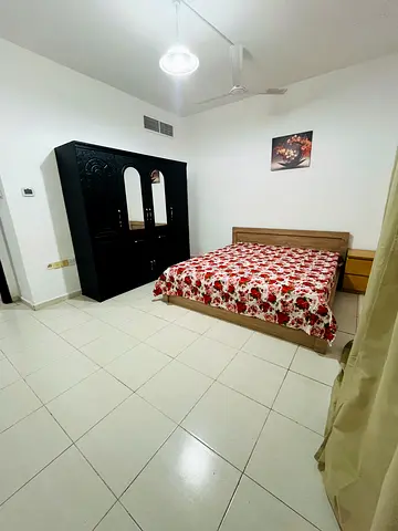Big Furnished Room with Balcony Available 1 min to Dubai/ Sharjah border For couples ladies or Male