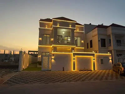 Villa for sale in Al Helio 2, Ajman. 5 bedrooms, majlis, living room, maid's room, and spacious kitchen. Registration fees included.