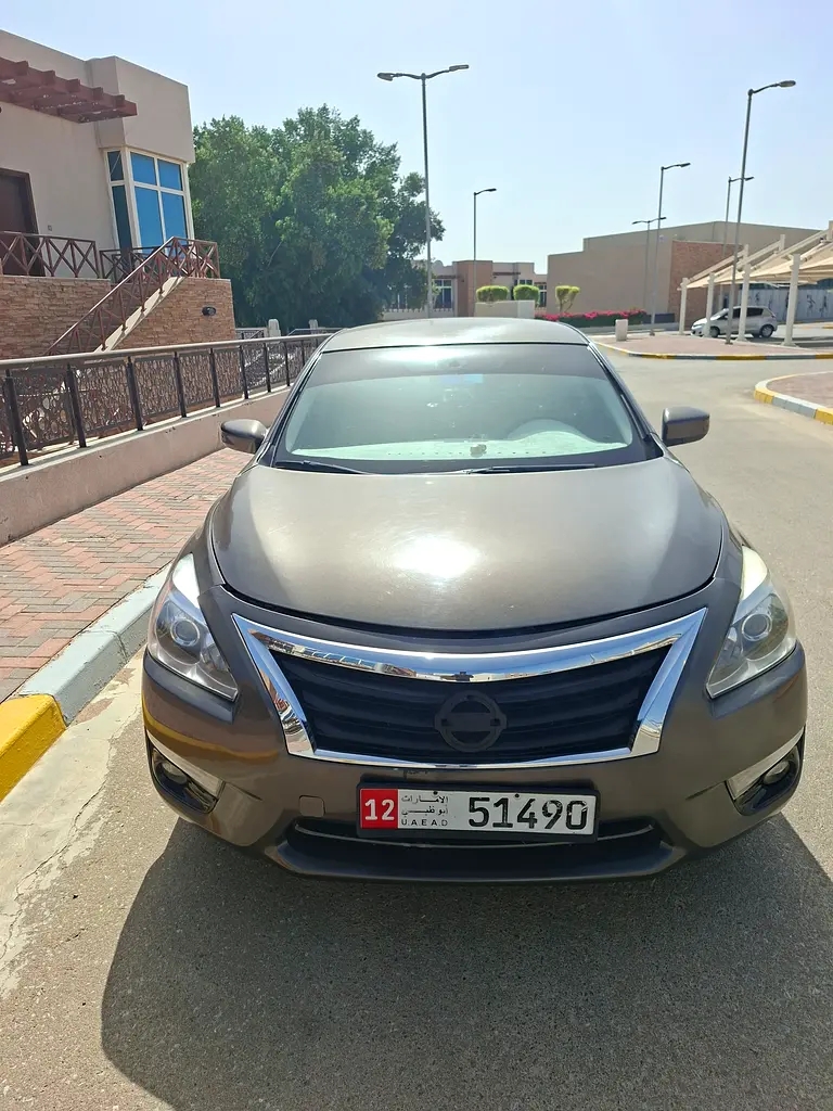 Nissan Altima 2015 — photo 1 of 6
