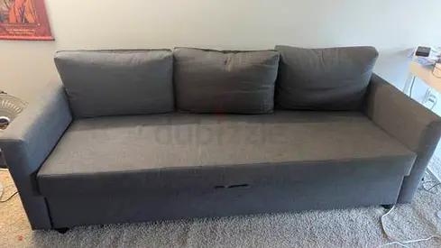 Comfortable Grey 3-Seater Sofa .Bed