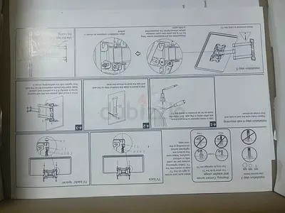 Universal TV Wall Mount Bracket with Tilt and Swivel - Used (Instructions Included)