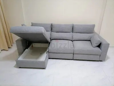Light grey ikea Eskilstuna sofabed with storage