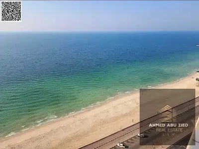 For Sale – Luxury Apartment with Direct Sea View in Corniche Residences – Ajman**