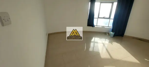 شقة ثلاث غرف وصالة وغرفة خادمة مع إطلالة مفتوحة للإيجار السنوي في أبراج الكونكورد عجمان الصناعية 1