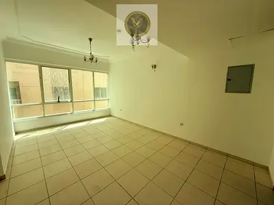One bedroom apartment with a living room balcony and two bathrooms for annual rent in Al Taawun Built in wardrobes Clean finishing Excellent natu