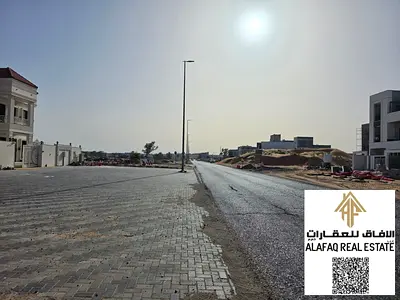 أرض زاوية للبيع في الباهية عجمان | على شارعين | شامل رسوم التسجيل | فرصة ممتازة لبناء فيلا أو استثمار ناجح