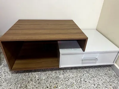 Low modern coffee table with storage drawer — two-tone wood and white
