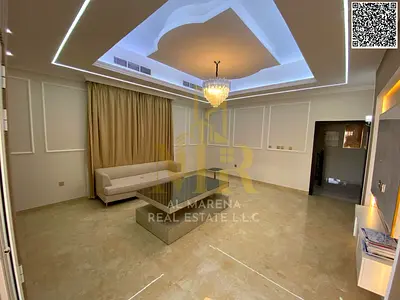 Modern villa for sale in Al Yasmin with a fully equipped kitchen and luxury finishing, price includes registration fees.