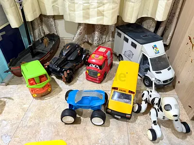 Lot of Mixed Toy Vehicles and Robotic Dog - Used Kids Toys Collection