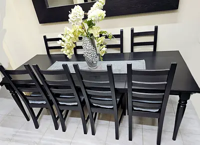 IKEA Solid wood Extendable dining table with 8 chairs.