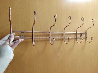 Metal Hanger for the back of a door or wall