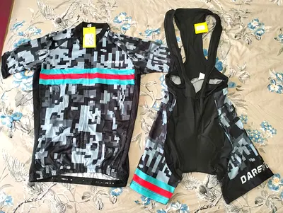 Brand New with Tag Cycling set of Shots with pad and Tshirt in Size M Pick up Al barsha 1, DIP 1,JVC