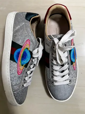 Preloved Gucci Gucci silver glitter Ace sneakers featuring an embroidered planet patch