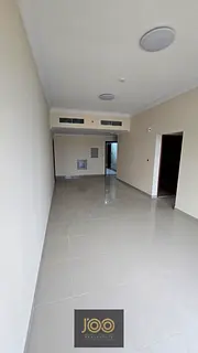 One bedroom and living room, two bathrooms, brand new, never before occupied in Al Jurf 3, near the