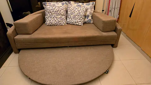 Light green 2-seater Sofa bed