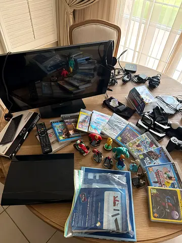 Sony PlayStation 3 bundle with games, controllers and accessories