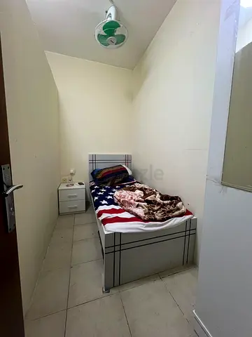Partition room available for single men at Al Nadha-Sharjah Border- Asians only