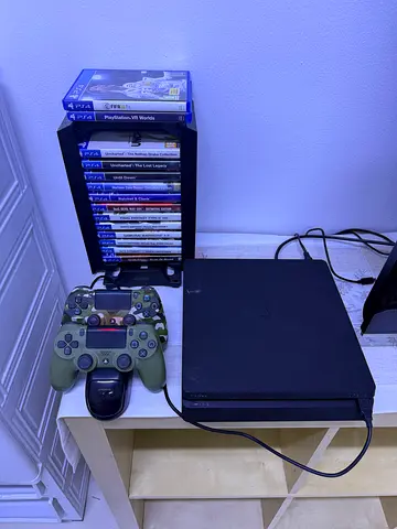 PlayStation 4 Slim with Controller and 14 ps4 Games