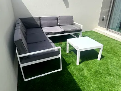 Outdoor L-shaped Patio Sofa Set with Coffee Table - White Frame, Dark Cushions