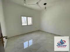Two bedrooms and a living room - in Al Qulaya area - Sharjah - central air conditioning - central ga