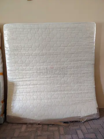 Good Condition Double Mattress Wrapped and Ready for Pickup