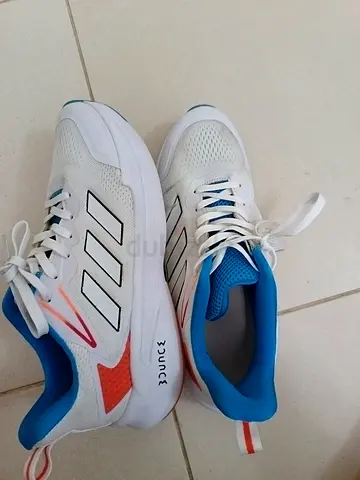 Lightly used white Adidas running shoes, size 9 uk)