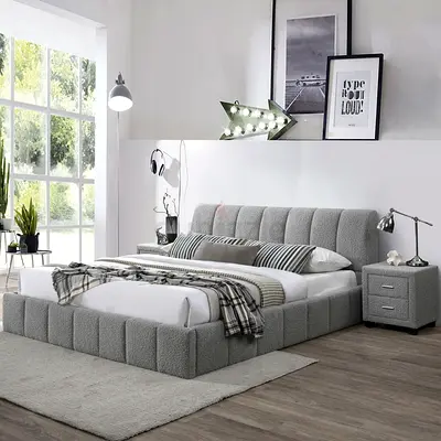 Light gray boucle king size bed with side tables