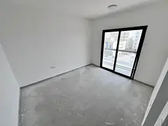 Master bedroom, first occupancy, 2 bathrooms, excellent finishes, directly on Mohammed Bin Zayed exi