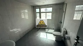 Huge Two Bedroom Apartment with American Kitchen and Balcony for Rent Al Rawda 2 Ajman Near Layali B