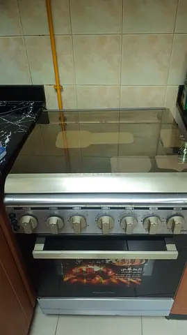 Used freestanding gas oven with glass top - good working condition