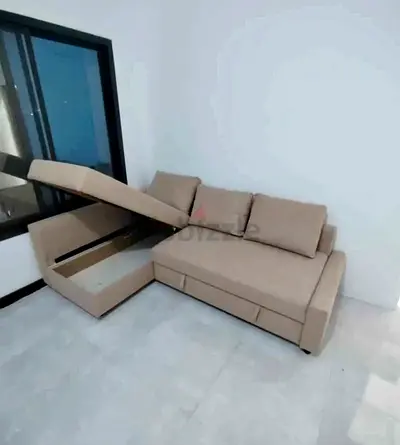 Light Beige L-Shaped Sofa with Storage - Good Condition