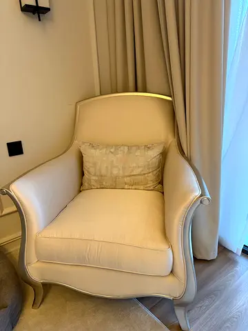 Cream upholstered accent armchair with cushion - good condition
