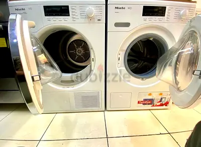 Miele latest model twin dos 9 kg washer and 9bkg dryer separate set freestanding.l1