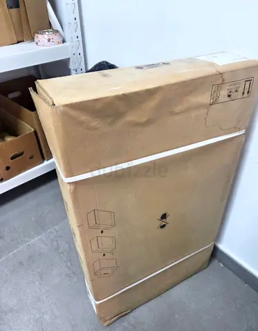 Flat-packed boxed furniture (sealed) — unused