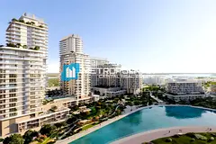 1BR w/ Balcony | Laundry Area | Waterfront Living